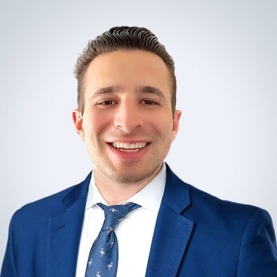 Headshot of Eric Greco.